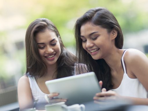 Students with a tablet computer